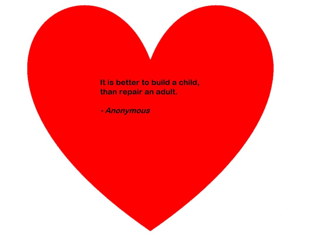 A heart bearing the words: It is better to build a child than to repair an adult.